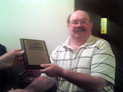 EAA Chapter 1027 gives President Paul Trexel an award